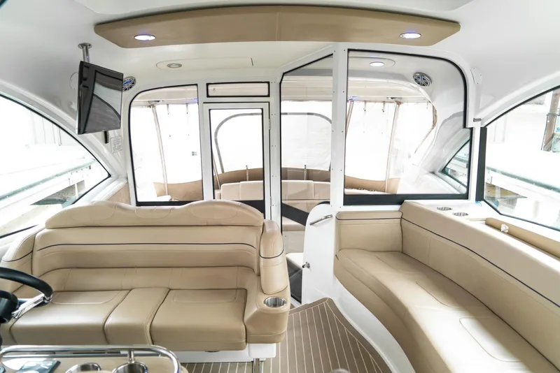Slide: The Image of Luxurious interior of a 2016 Formula 45 Yacht with beige seating and modern design. - 15
