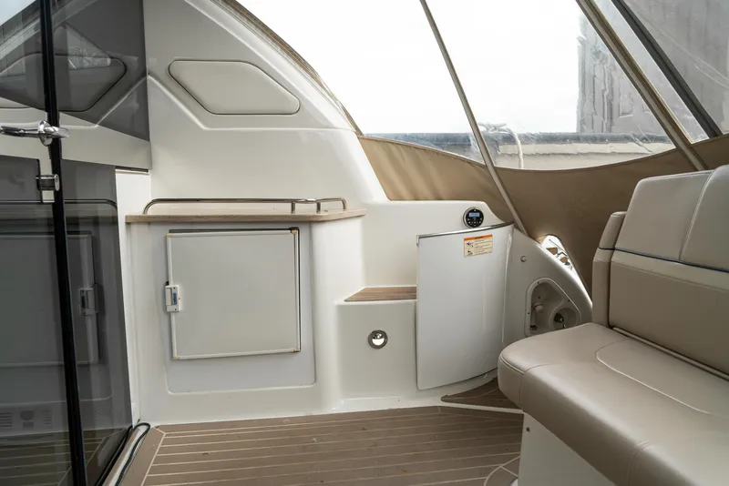 Slide: The Image of Interior of 2016 Formula 45 Yacht, featuring sleek seating and modern cabinetry. - 28