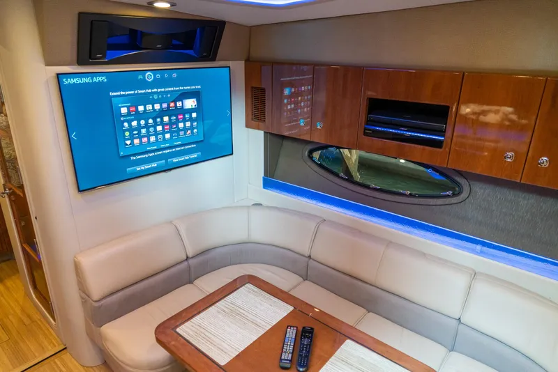 Slide: The Image of Luxurious interior of 2016 Formula 45 Yacht with TV, seating, and wooden cabinetry. - 31