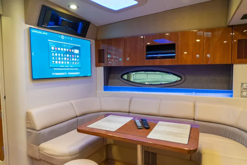 Slide: The Image of Luxurious interior of 2016 Formula 45 Yacht with seating, table, and TV. - 32