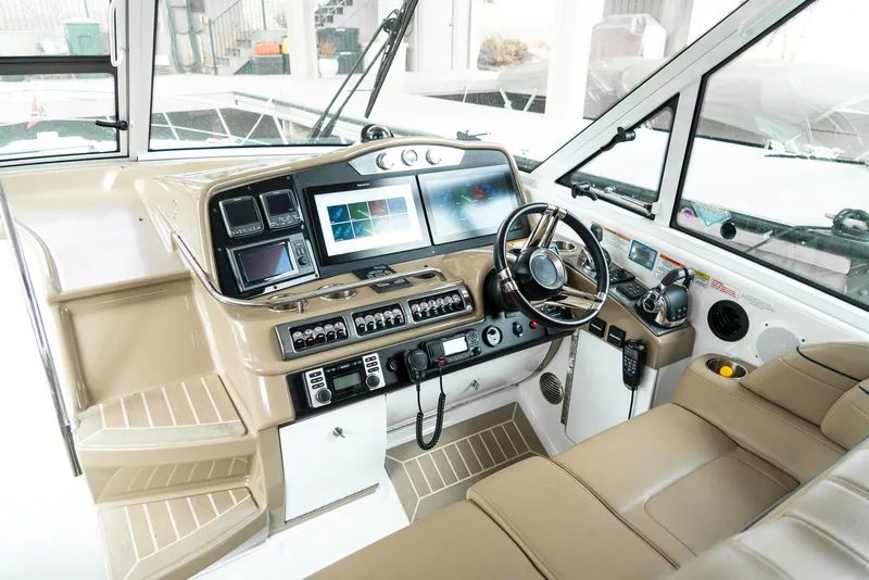 Slide: The Image of Cockpit of 2016 Formula 45 Yacht with modern navigation equipment and luxurious seating. - 4