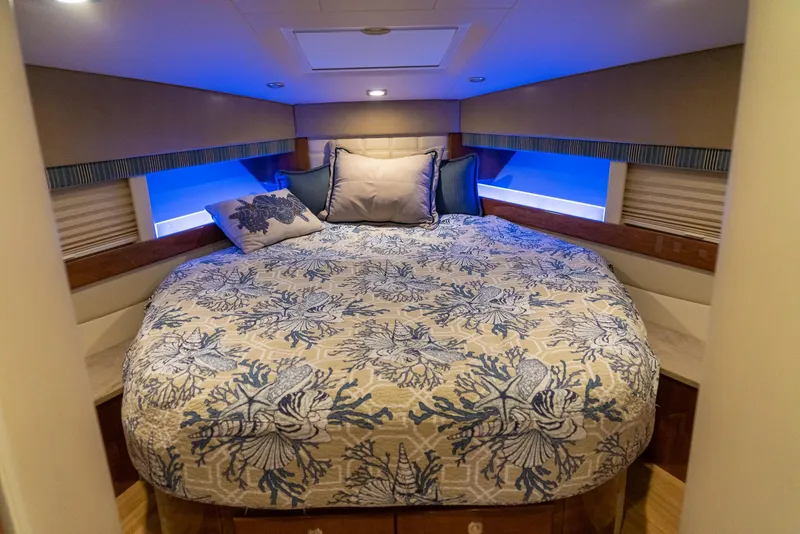 Slide: The Image of Luxurious bedroom interior of 2016 Formula 45 Yacht with elegant bedding and ambient lighting. - 45