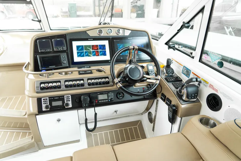 Slide: The Image of 2016 Formula 45 Yacht cockpit with advanced navigation controls and luxurious interior design. - 6
