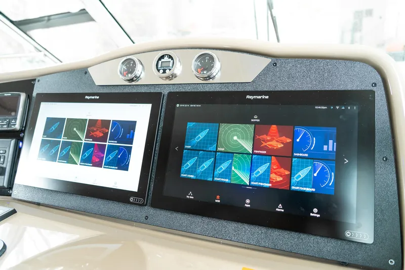 Slide: The Image of Dashboard of 2016 Formula 45 Yacht with dual Raymarine navigation displays. - 8