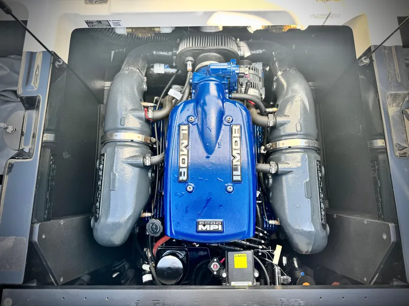 Slide: The Image of 2018 MasterCraft XT22 engine, featuring Ilmor MPI technology, in a sleek blue and gray design. - 22