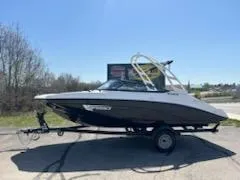 The Image of 2025 Yamaha Boats AR190 on trailer under clear blue sky. - 0