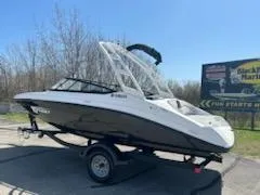 Slide: The Image of 2025 Yamaha Boats AR190 on trailer, parked outdoors under clear blue sky. - 3