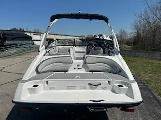 Slide: The Image of 2025 Yamaha Boats AR190, rear view, parked outdoors on a sunny day. - 5