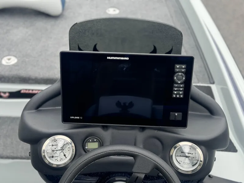 Slide: The Image of Dashboard of 2025 Phoenix 721 ZXL boat with Humminbird electronics and gauges. - 13