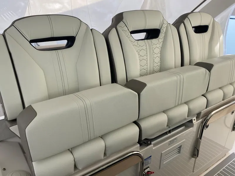 Slide: The Image of Luxury seating on 2023 Tiara Sport 38 LS boat, featuring elegant design and premium materials. - 12