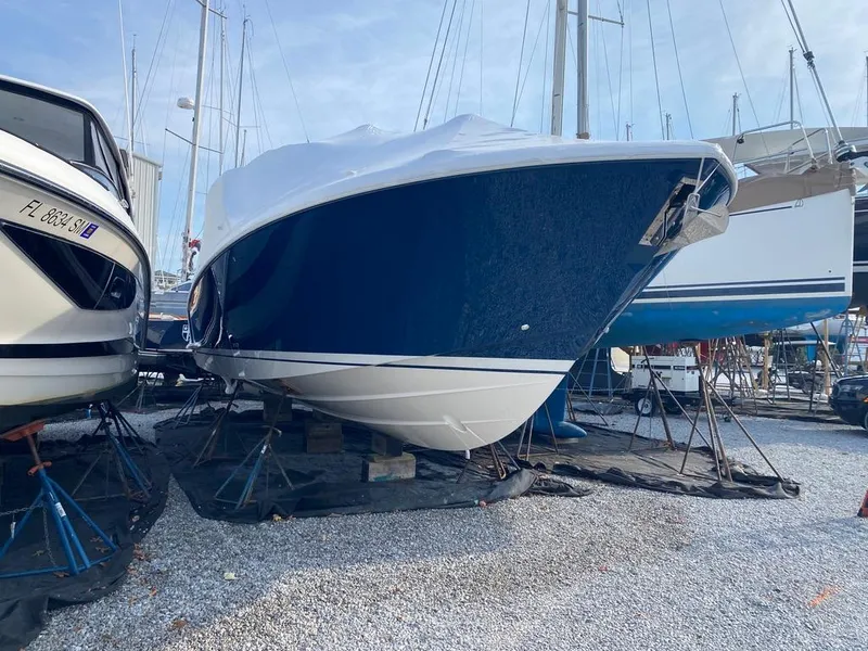 Slide: The Image of 2023 Tiara Sport 38 LS boat in dry dock, covered and elevated for maintenance. - 6