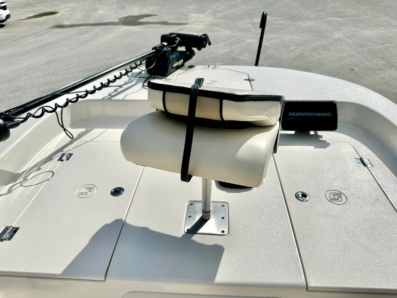 Slide: The Image of 2021 Carolina Skiff 21 LS boat deck with seat and trolling motor. - 15