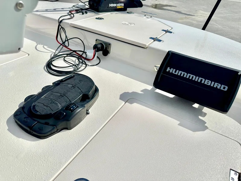 Slide: The Image of 2021 Carolina Skiff 21 LS boat deck with Humminbird electronics and Minn Kota trolling motor. - 19