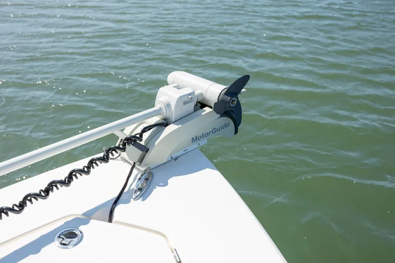 Slide: The Image of Trolling motor on 2023 Pathfinder 2300 HPS boat in calm water. - 13