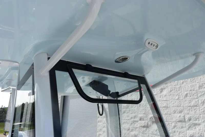 Slide: The Image of 2025 Sea Hunt Ultra 305 SE boat interior, featuring sleek design and modern amenities. - 13