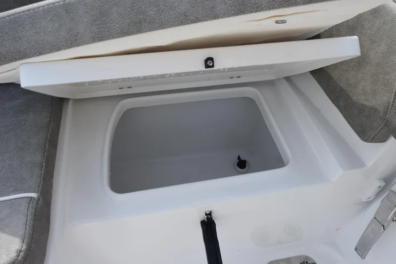 Slide: The Image of Open storage compartment on 2025 Sea Hunt Ultra 305 SE boat. - 20