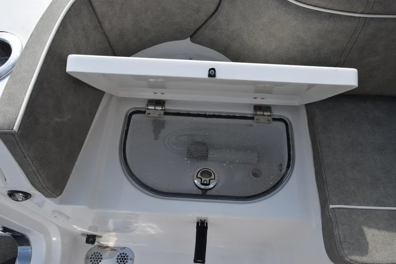 Slide: The Image of Open storage compartment on 2025 Sea Hunt Ultra 305 SE boat interior. - 21