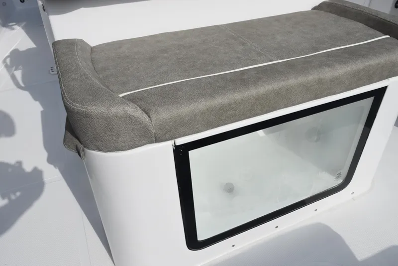 Slide: The Image of 2025 Sea Hunt Ultra 305 SE boat seat with storage compartment. - 23