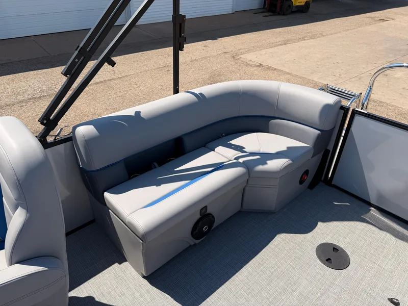 Slide: The Image of 2025 Bentley Pontoons Bolt 223 interior with gray seating and modern design. - 14