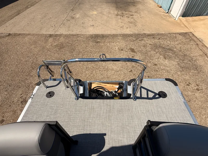 Slide: The Image of 2025 Bentley Pontoons Bolt 223 deck with seating and railing, viewed from above. - 24