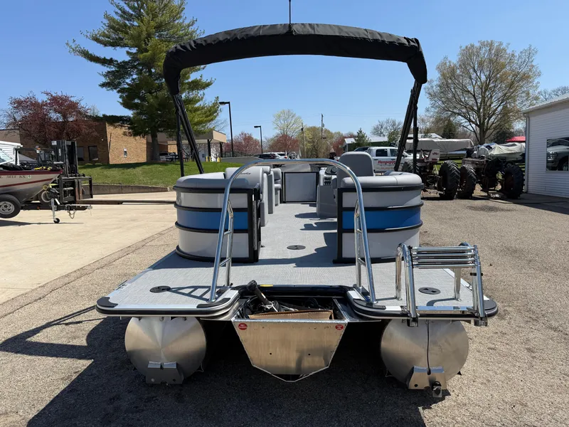 Slide: The Image of 2025 Bentley Pontoons Bolt 223 pontoon boat with canopy, parked outdoors on a sunny day. - 6