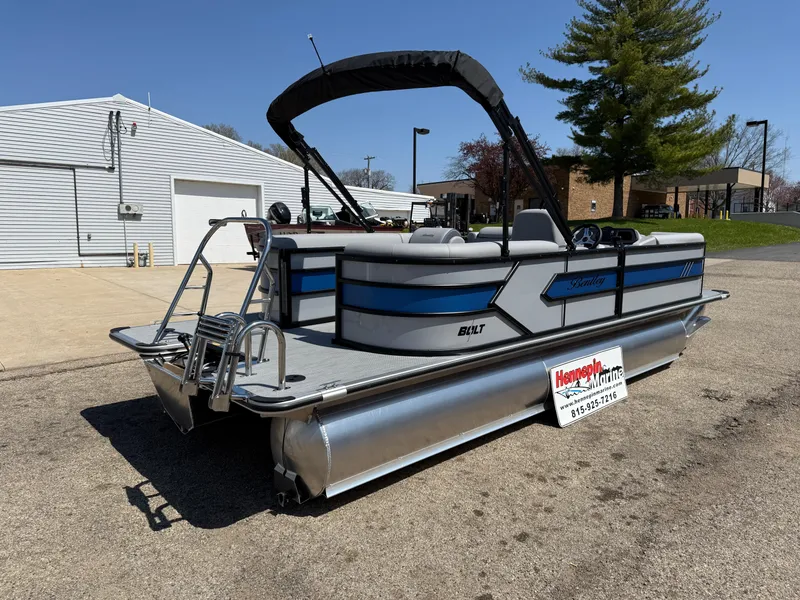 Slide: The Image of 2025 Bentley Pontoons Bolt 223 pontoon boat parked outdoors on a sunny day. - 7