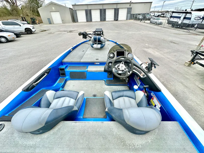 Slide: The Image of 2009 Stratos 294 XL Evolution boat interior with dual seats and steering console. - 13