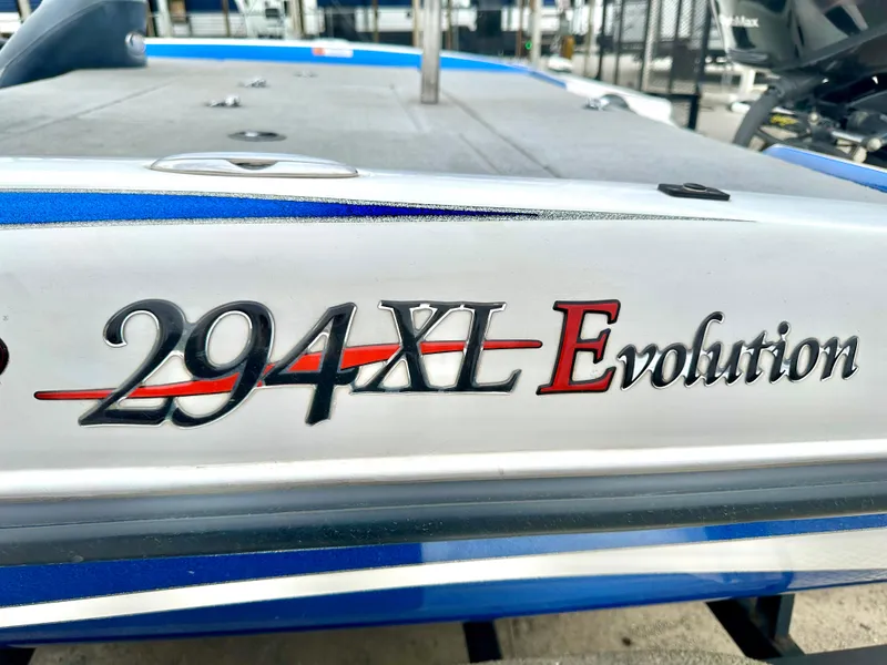 Slide: The Image of 2009 Stratos 294 XL Evolution boat, close-up of model name on hull. - 22