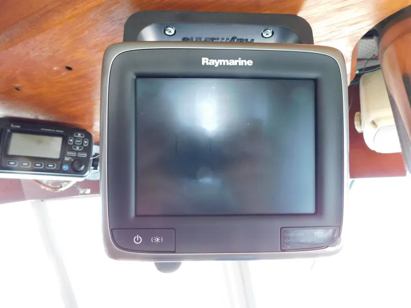Slide: The Image of Raymarine navigation system on 1979 Grand Banks 32 Sedan boat dashboard. - 7