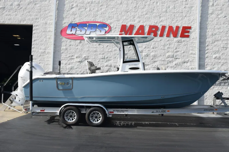Slide: The Image of 2025 Sea Hunt Ultra 255 SE boat on trailer at GSPS Marine dealership. - 1