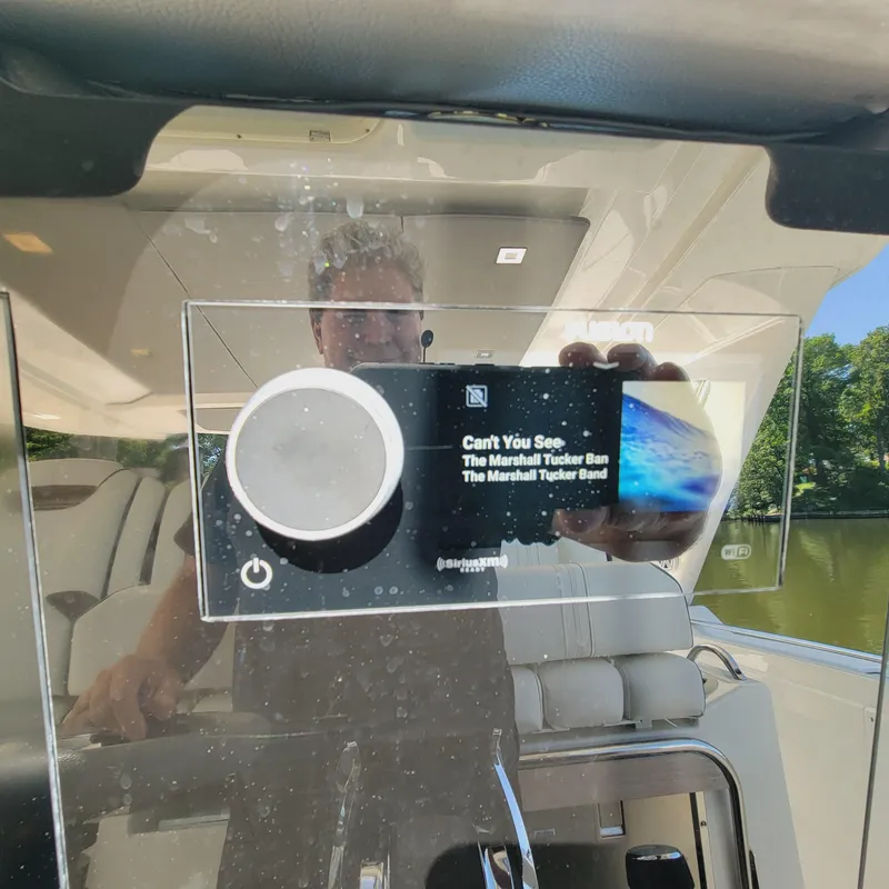 Slide: The Image of Interior of 2021 Tiara Yachts 38 LS with music display reflecting surroundings. - 41