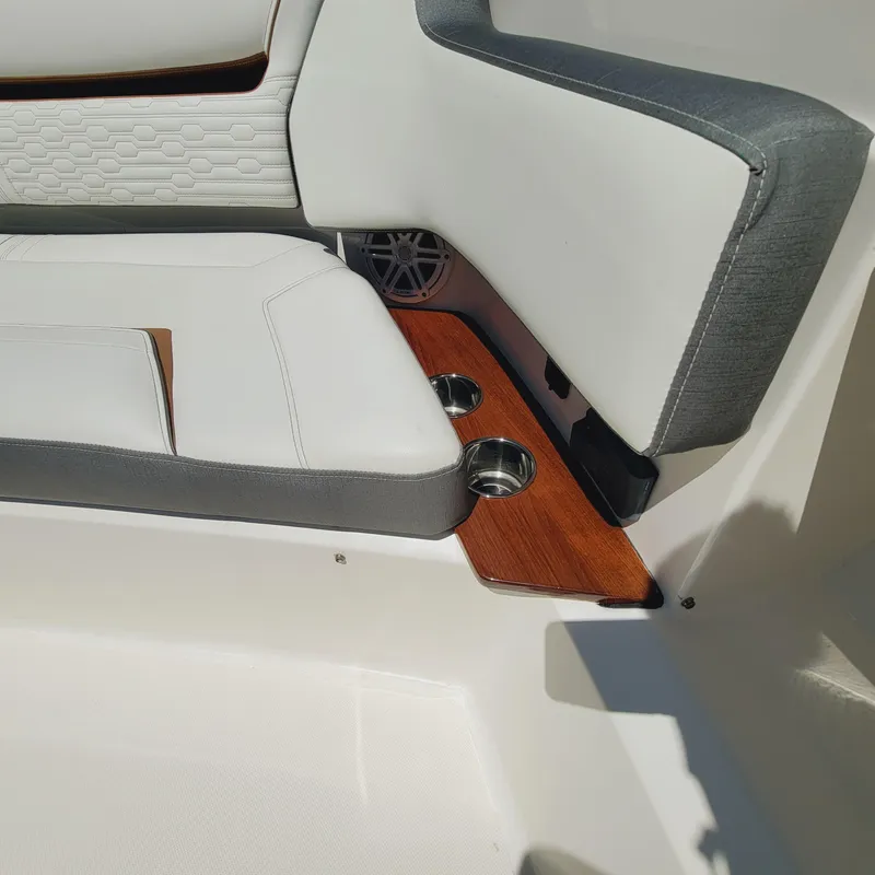 Slide: The Image of 2021 Tiara Yachts 38 LS interior seating with cup holders and elegant design. - 47