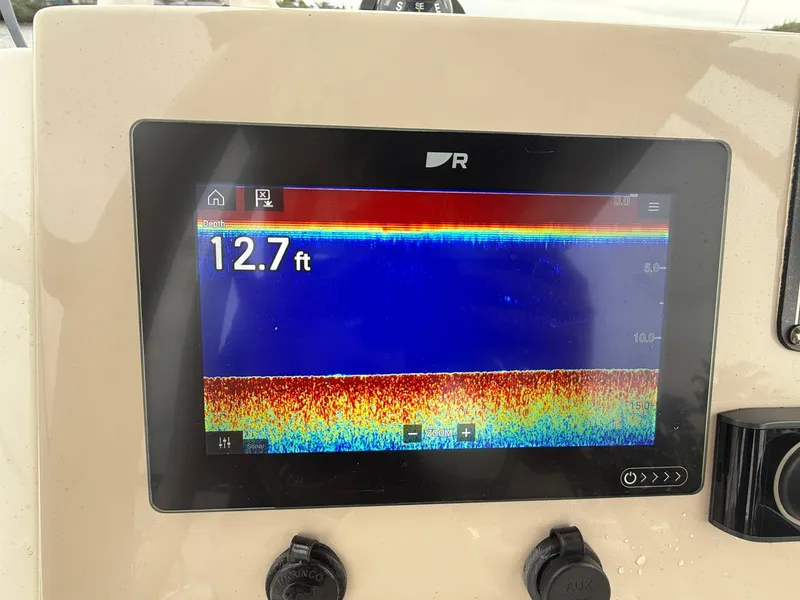 Slide: The Image of Fishfinder display on 2022 Boston Whaler 210 Montauk showing depth of 12.7 feet. - 16