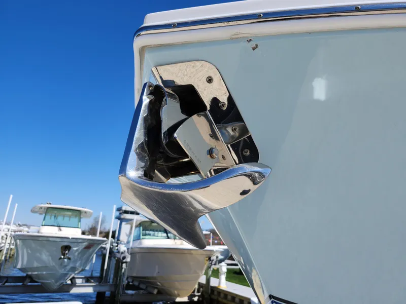 Slide: The Image of 2020 Regulator 25 boat anchor detail with clear blue sky background. - 26