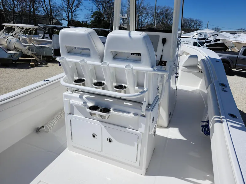 Slide: The Image of 2020 Regulator 25 boat interior with seating and storage compartments. - 8