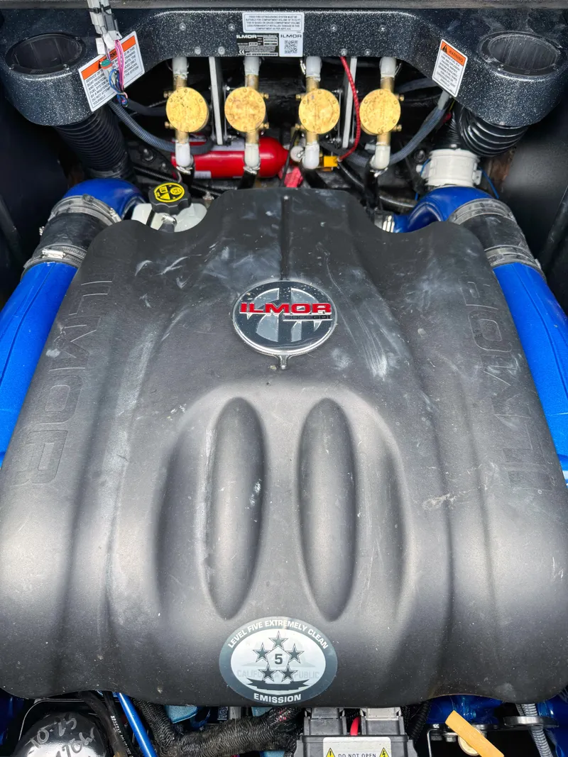 Slide: The Image of 2019 MasterCraft X24 engine with Ilmor branding, showcasing powerful marine performance. - 8