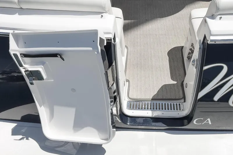 Slide: The Image of 2018 Tiara Yachts 3100 Coronet open door, showcasing sleek design and craftsmanship. - 24