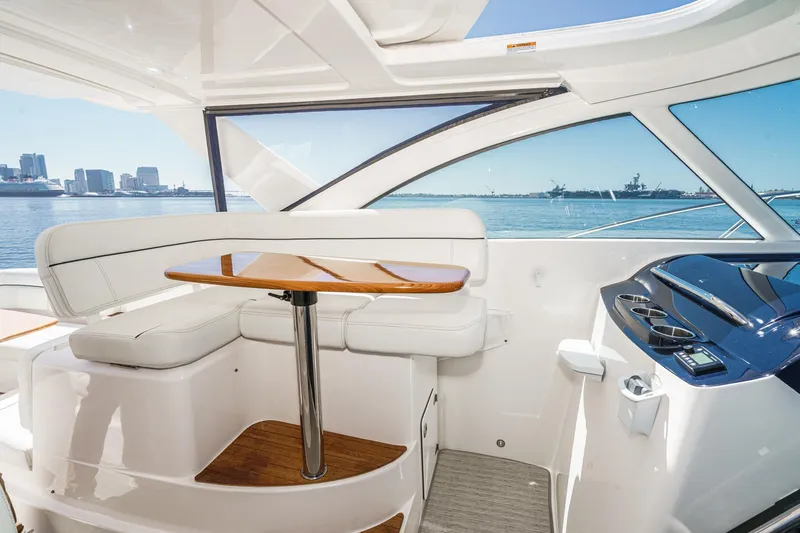 Slide: The Image of 2018 Tiara Yachts 3100 Coronet interior with seating and ocean view. - 34