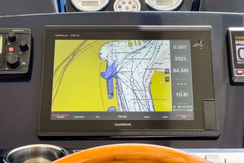 Slide: The Image of Garmin GPS display on 2018 Tiara Yachts 3100 Coronet dashboard, showing nautical chart. - 40
