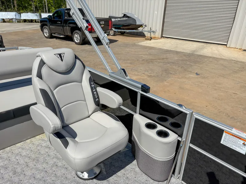 Slide: The Image of Captain's chair on 2025 Trifecta 22 UL LE T 2.75 pontoon boat, with cup holders. - 10