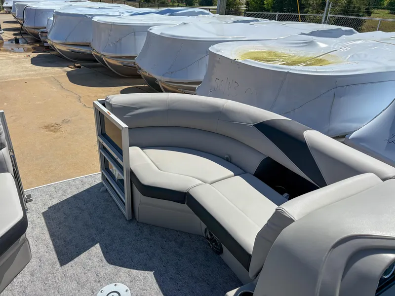 Slide: The Image of 2025 Trifecta 22 UL LE T 2.75 pontoon boat with covered seating area. - 12