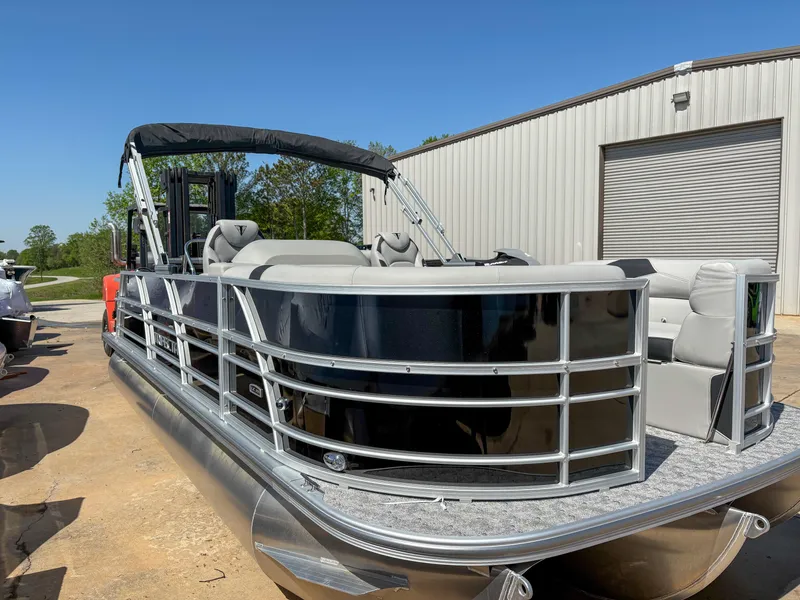 Slide: The Image of 2025 Trifecta 22 UL LE T 2.75 pontoon boat with sleek design and comfortable seating. - 3