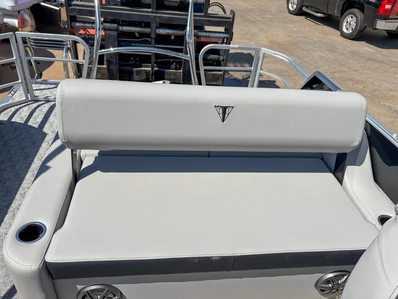 Slide: The Image of 2025 Trifecta 22 UL LE T 2.75 boat with gray seating and cup holders. - 8