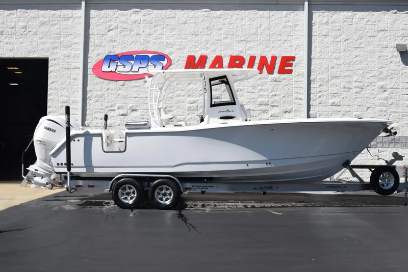 Slide: The Image of 2025 Sea Hunt Gamefish 28 boat on trailer at GSPS Marine dealership. - 1