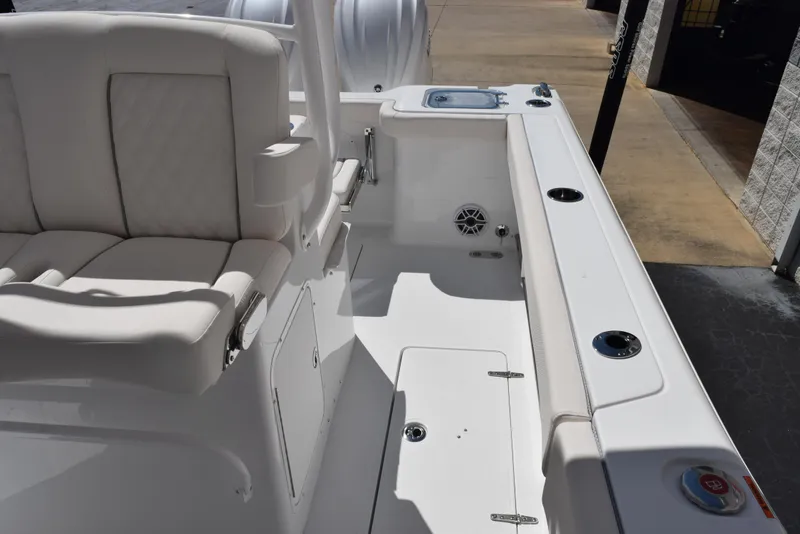 Slide: The Image of 2025 Sea Hunt Gamefish 28 boat interior with seating and storage compartments. - 16