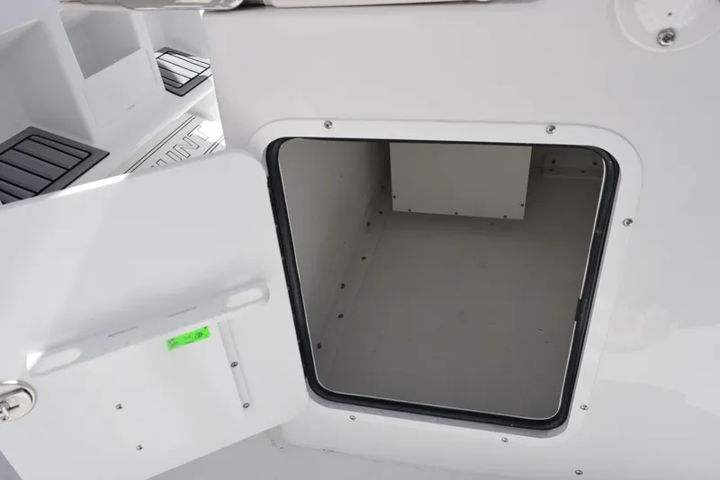 Slide: The Image of Open storage compartment on a 2025 Sea Hunt Gamefish 28 boat. - 18