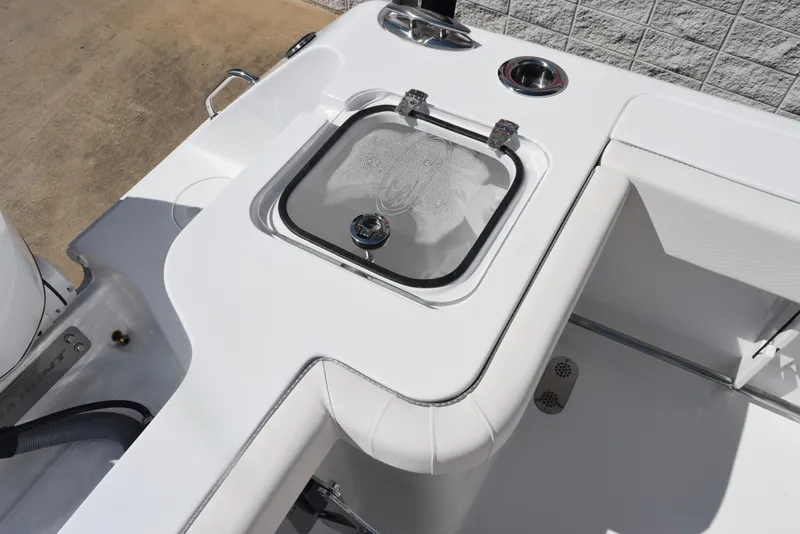 Slide: The Image of 2025 Sea Hunt Gamefish 28 boat interior with livewell and seating area. - 29