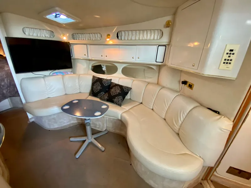 Slide: The Image of Luxurious 1997 Sea Ray 400 Sundancer interior with plush seating and modern amenities. - 20
