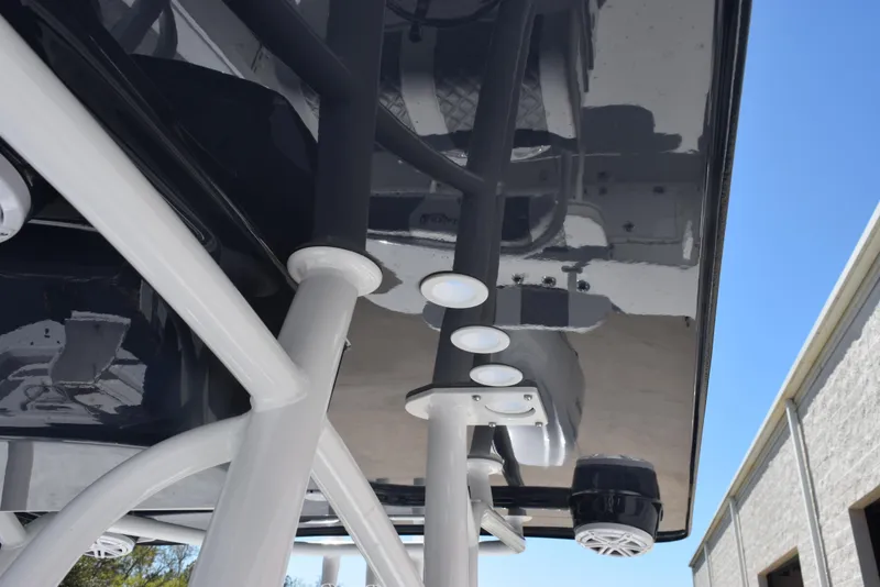 Slide: The Image of 2025 BlackJack 256 Coastal boat with sleek black and white design, featuring modern fixtures. - 20