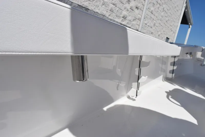 Slide: The Image of 2025 BlackJack 256 Coastal boat interior, showcasing sleek white design and modern features. - 24